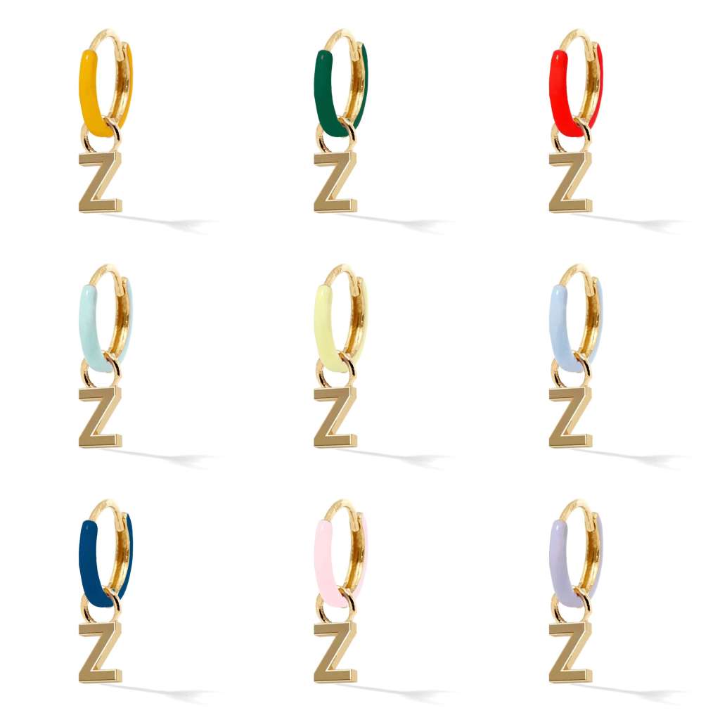 Enamel hoop earring with dangling gold letter Z.