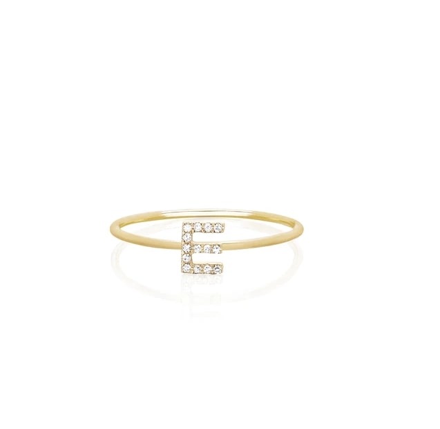 Yellow gold band with a diamond studded letter E on the top.